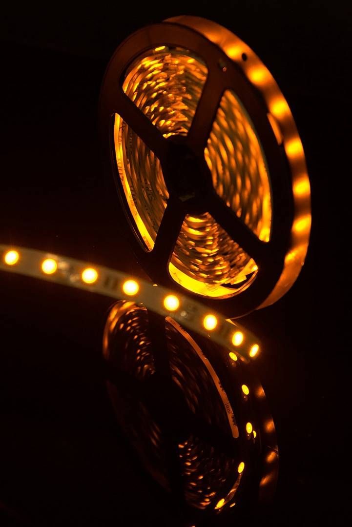 фото лента swg 14,4w/m  60led/m 5050smd желтый 5m swg560-12-14.4-y-m 009262 | 220svet.ru